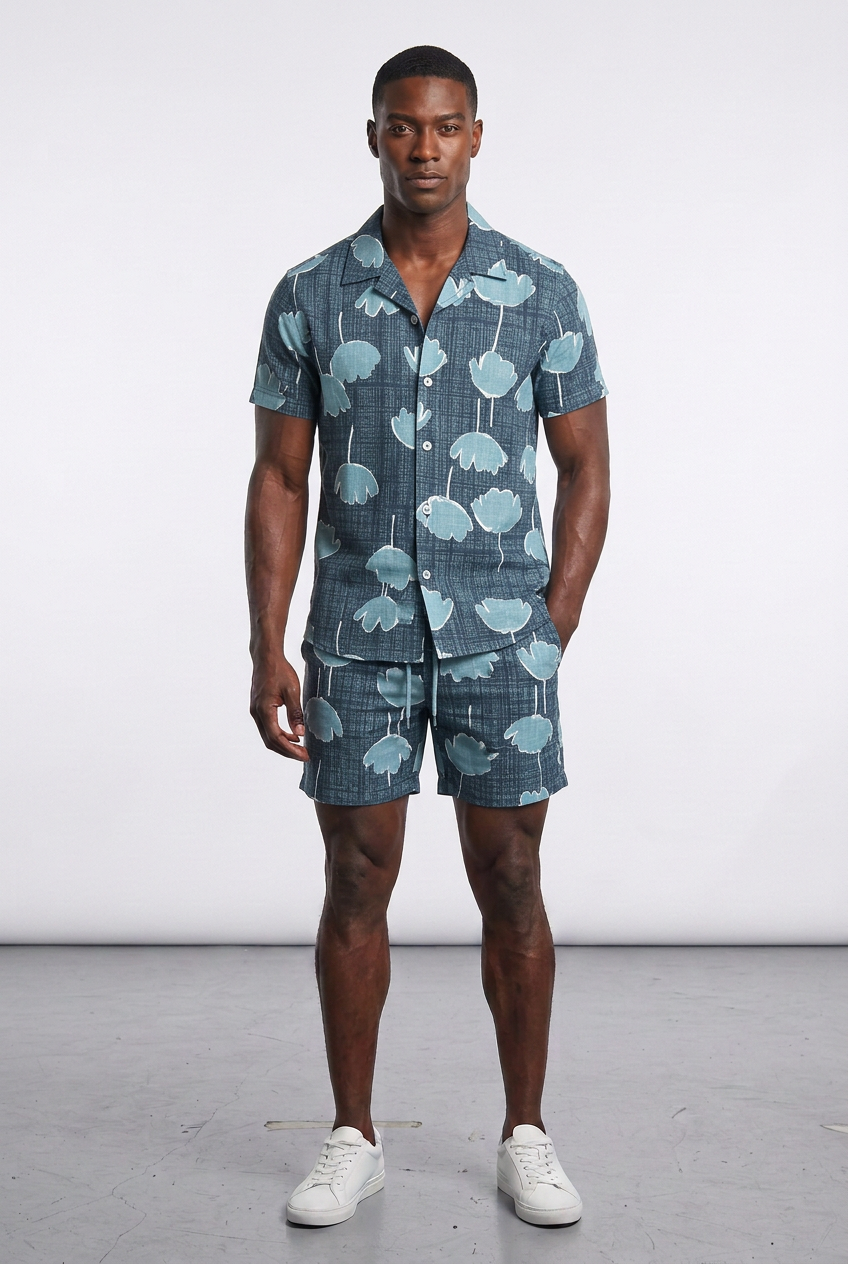 Model wearing the Nijays Couture slate blue floral print shirt and matching shorts