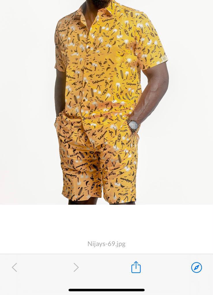 Model wearing the Nijays Couture golden yellow script print shirt and matching shorts